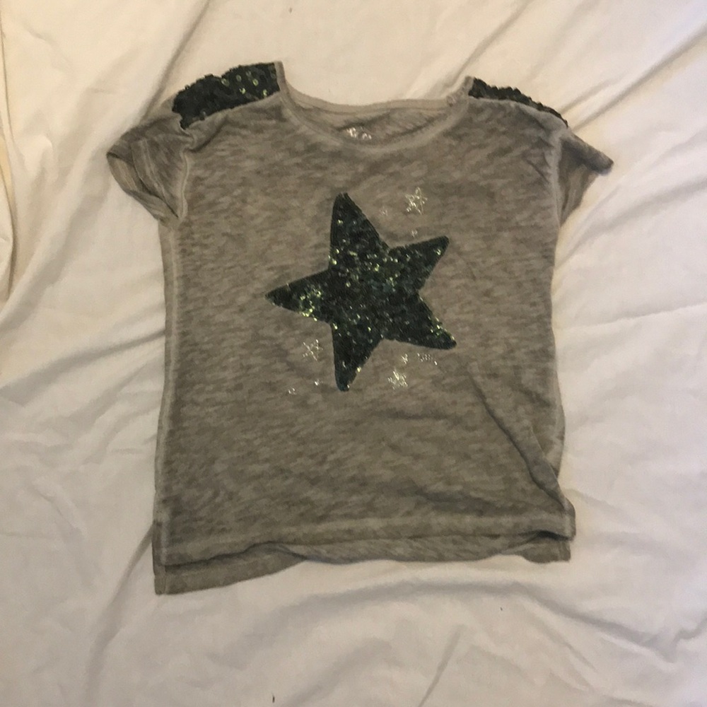 An army green glittery top